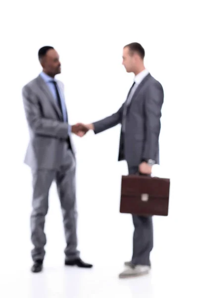 Blurred business people. Handshake of two business men. — Stock Photo, Image