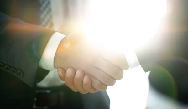 Businessman giving his hand for handshake to partner — Stock Photo, Image