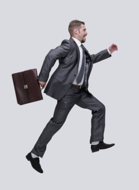 yan view.cheerful işadamı ile ileri adım evrak çantası