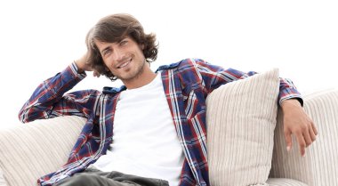 ciddi modern adam kanepede oturan