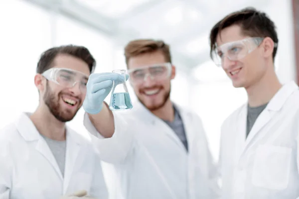 Scientists rejoice at the result of their work. — Stock Photo, Image