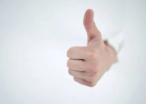 Mans mano rompiendo a través de la pared de papel y señalándote — Foto de Stock