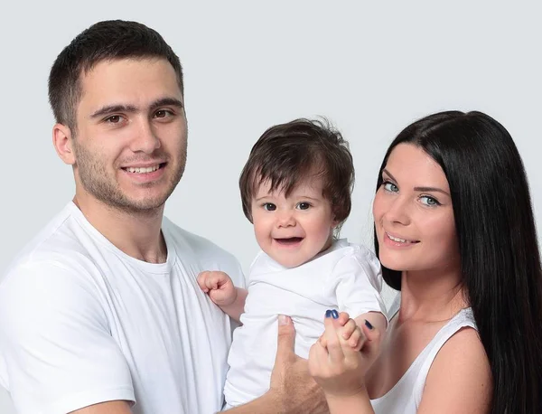 Glückliche Familie mit neugeborenem Baby auf weißem Hintergrund. — Stockfoto