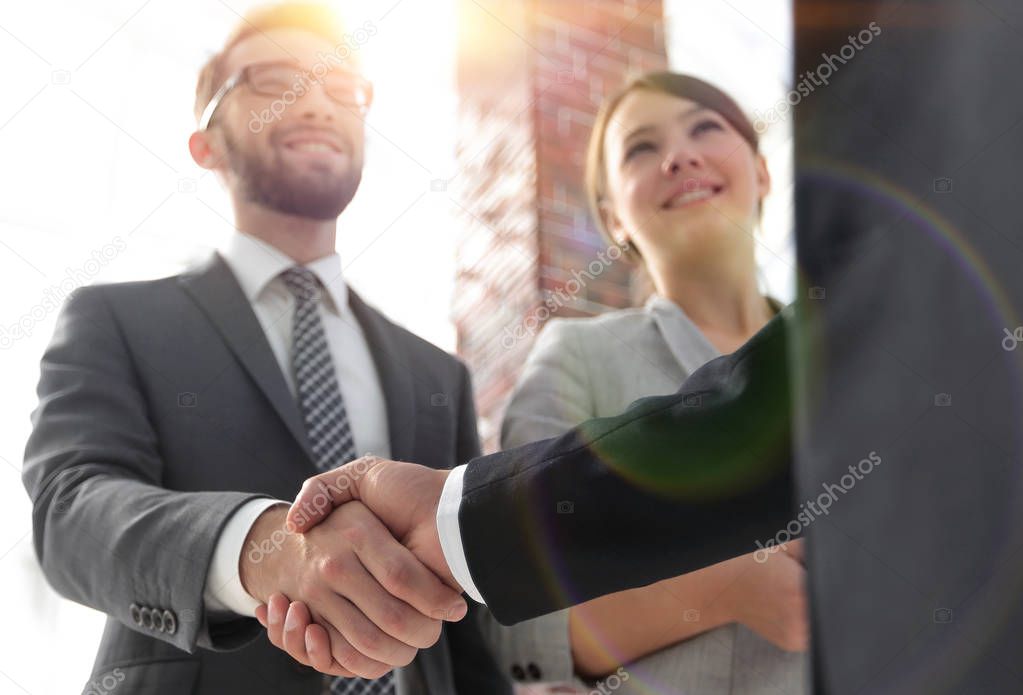 friendly handshake of business people.