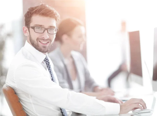 Businessman on blurred background office — Stock Photo, Image