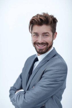 Beyaz bir arka planda izole edilmiş yakışıklı bir adamın portresi.