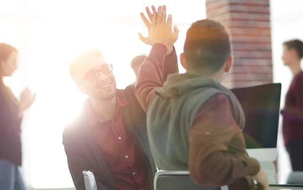 Business colleagues giving each other high five — Stock Photo, Image