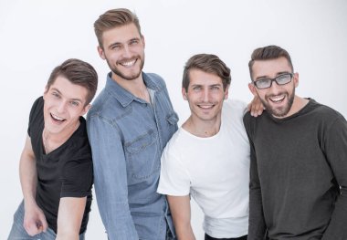 Çeşitlilik içinde bir grup insan takım olarak ayakta duruyor.