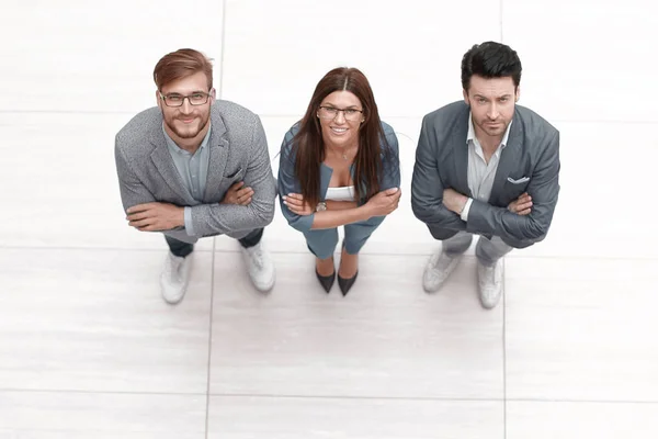 View.three business colleagues standing together — Stock Photo, Image