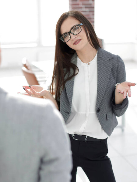 business woman talking to an office worker