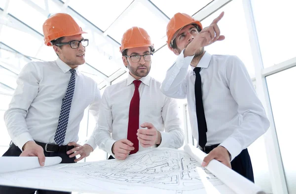 Group of designers of builders working with a new projec — Stock Photo, Image