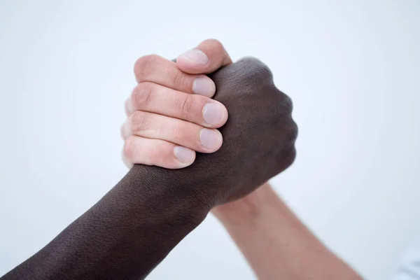 Close up.handshake of international business people. — Stock Photo, Image