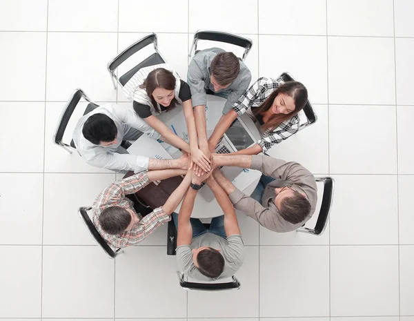 Top view.successful business team piegando le mani insiemethe — Foto Stock