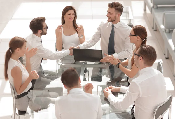 Business partners shaking hands at a business meeting — Stock Photo, Image