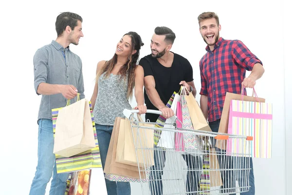 Gruppo di giovani che discutono i loro acquisti — Foto Stock