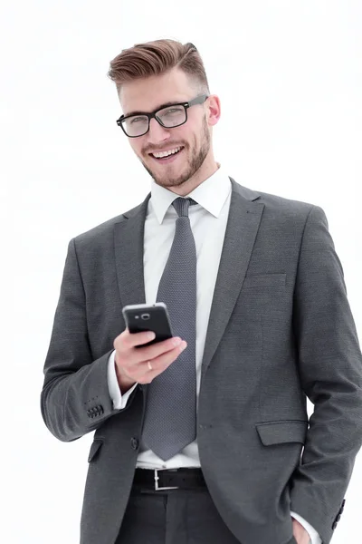Succesvolle zakenman met een smartphone. — Stockfoto