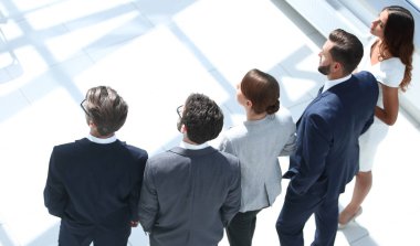 arka view.a grup iş adamları birlikte ayakta