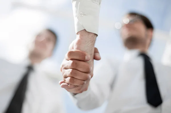 Business background.business Handshake auf dem Hintergrund der — Stockfoto