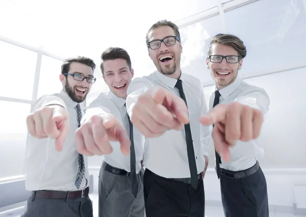 happy employees pointing at you