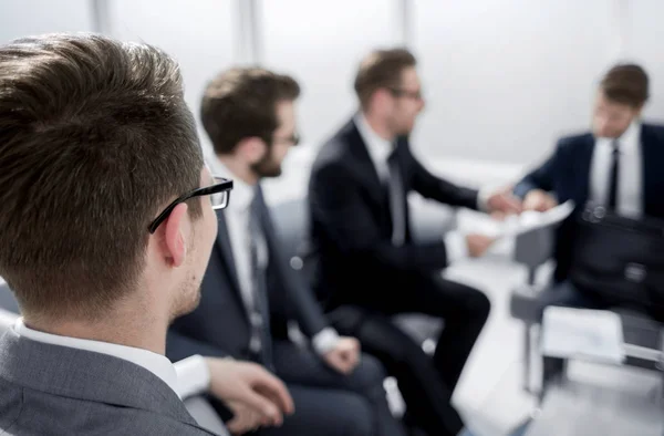 Rear view.businessman looking into the conference room — Stock Photo, Image