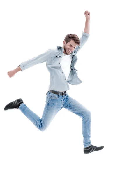 Щасливий чоловік стрибає в повітрі над білим тлом — стокове фото