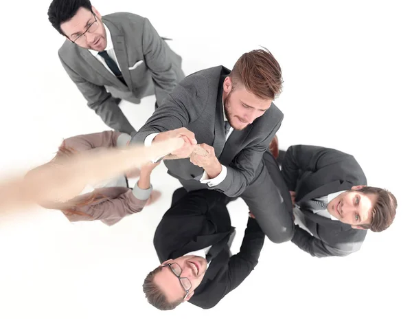 Top view .the business team helps the leader to rise up. — Stock Photo, Image