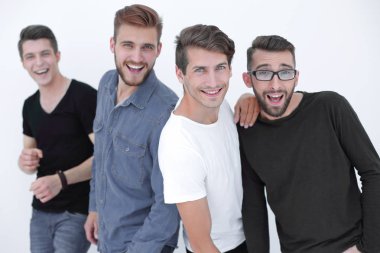 Çeşitlilik içinde bir grup insan takım olarak ayakta duruyor.