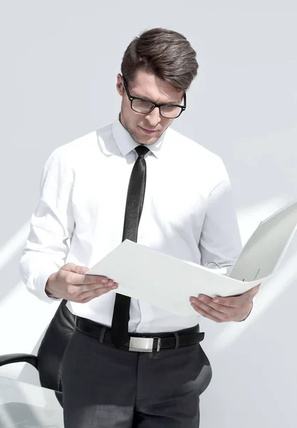 Close up.businessman carefully studying the terms of the contrac — Stock Photo, Image