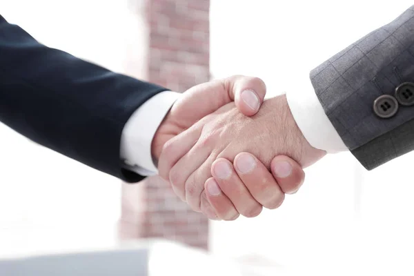 Closeup.handshake de parceiros de negócios — Fotografia de Stock