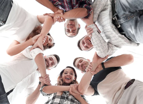 Gelukkig groep ondernemers hun handen in samenwerking stapelen — Stockfoto