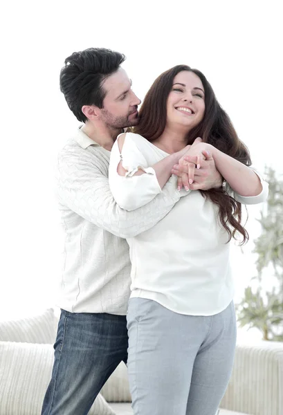 Happy husband hugging pregnant wife — Stock Photo, Image