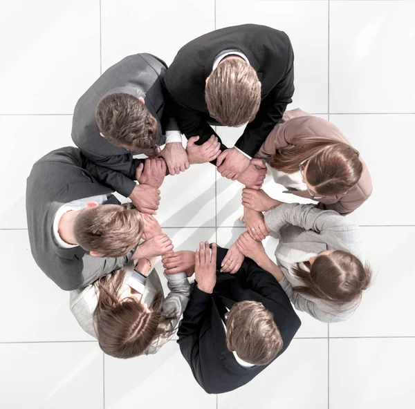 Vista superior. equipe de negócios formando um círculo — Fotografia de Stock