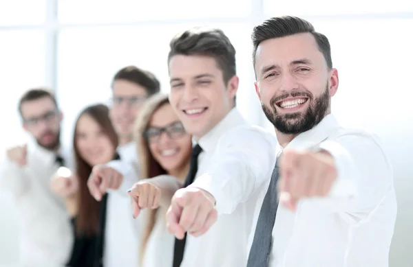 Happy business team pointing at you. — Stock Photo, Image