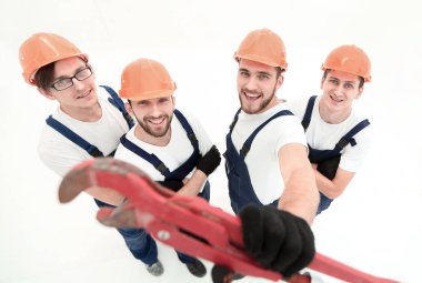 bir gaz anahtarı gösterilen inşaatçılar top.group görüntülemek.