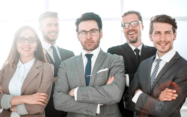 Group of business partners looking at camera with smiles — Stock Photo, Image