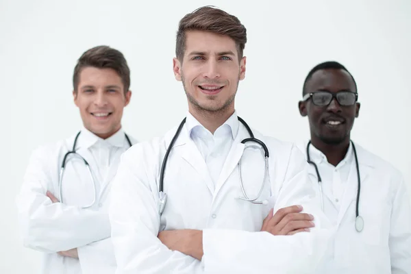 Drie ervan overtuigd artsen collega's permanent samen — Stockfoto