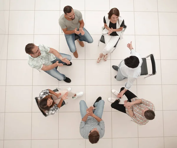 Top view.el equipo de negocios aplaude su éxito — Foto de Stock