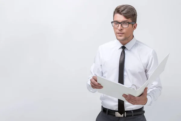 Young businessman with a clipboard — Stock Photo, Image