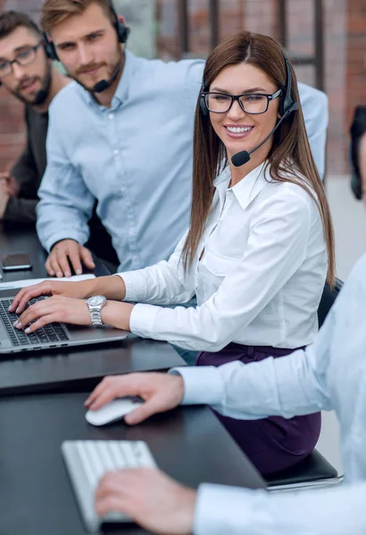 Close up.young call center staff sitting at the Desk — Stock Photo, Image