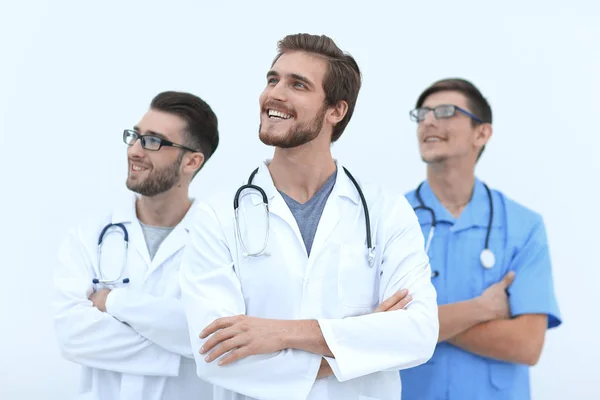 Equipo de médicos mirando el espacio de copia — Foto de Stock