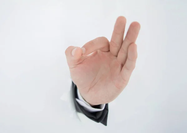 Close up .businessman showing OK gesture — стоковое фото