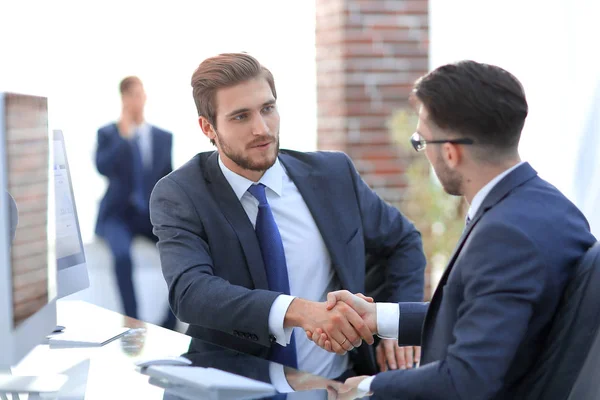 Image of two young businessmen interacting at meeting in office — Stock Photo, Image