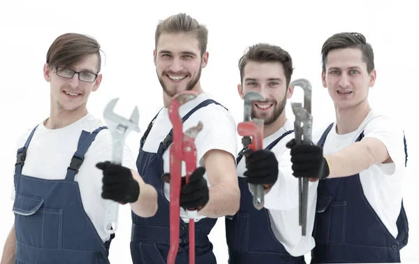 Groupe de travailleurs de la construction avec outils de travail — Photo