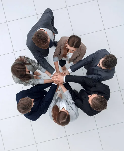 Top view.business equipe unindo as mãos — Fotografia de Stock