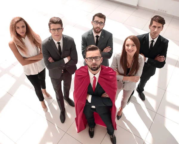 Top view.businessman-Superman y su equipo de negocios de pie tog — Foto de Stock