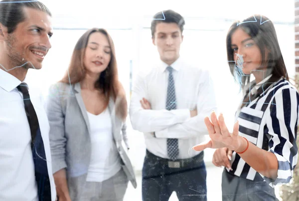 Bakom glaset.business team på kontoret — Stockfoto