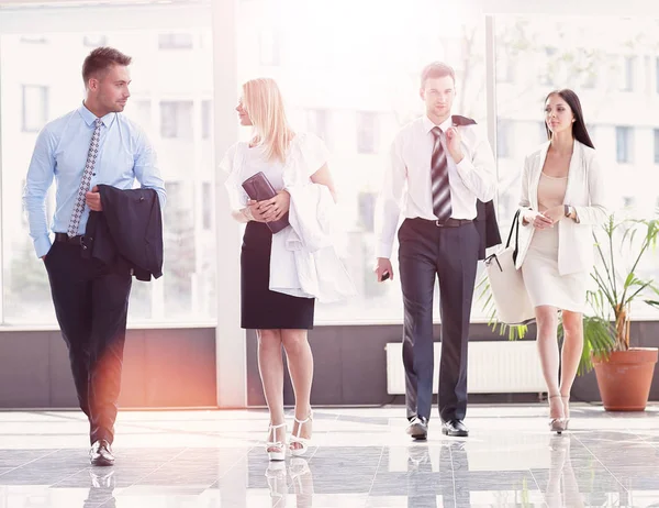 Business people standing in the lobby of the modern office. — Stock Photo, Image