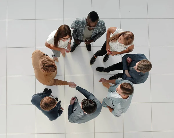 Ovanifrån. Handshake affärsmän — Stockfoto