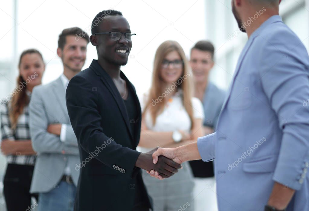 Happy smiling afro american businessman and caucasian businessma