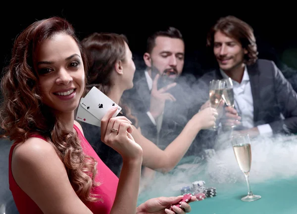 Adult group celebrating friend winning blackjack — Stock Photo, Image